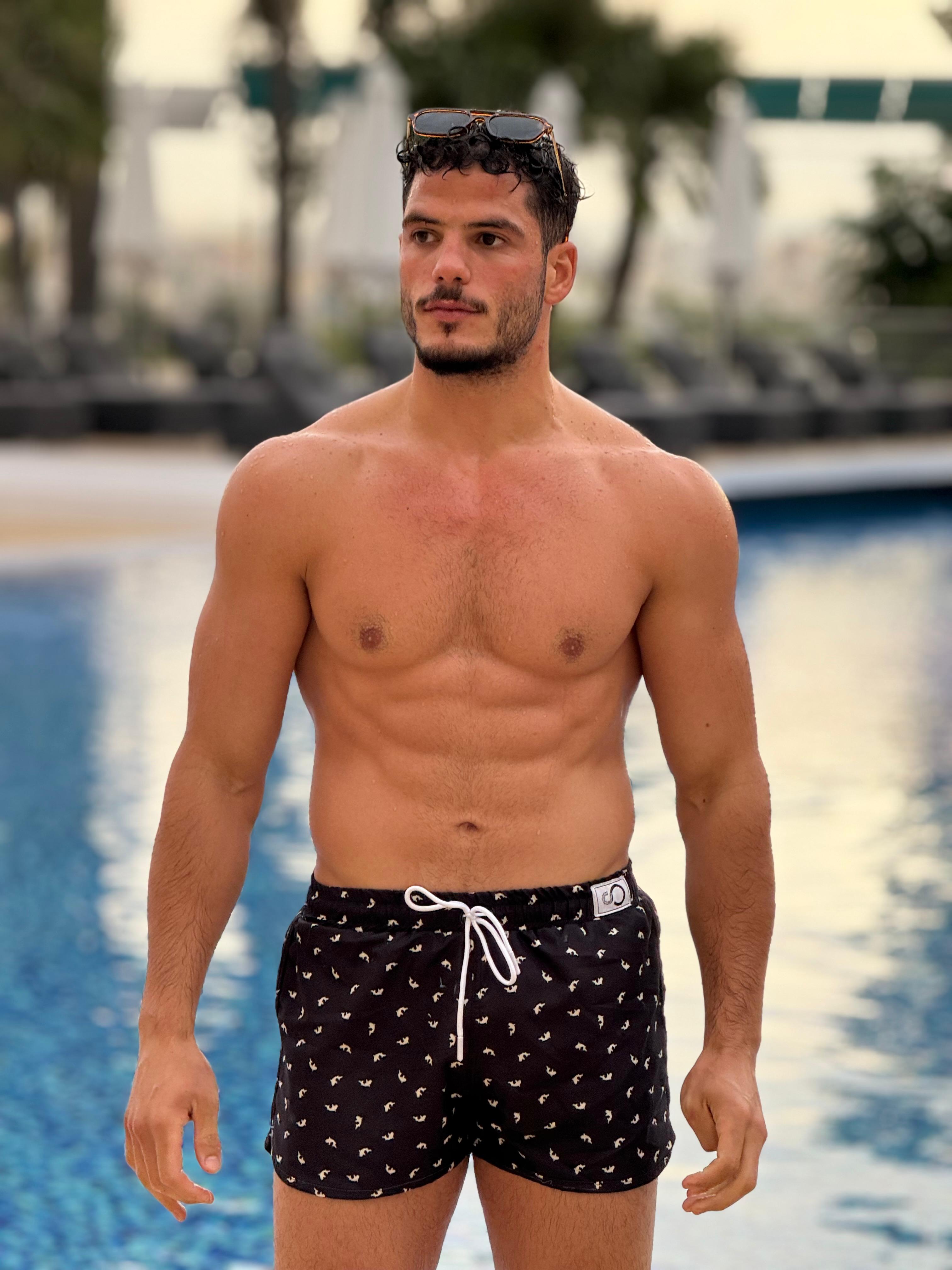short patterned swimming trunk