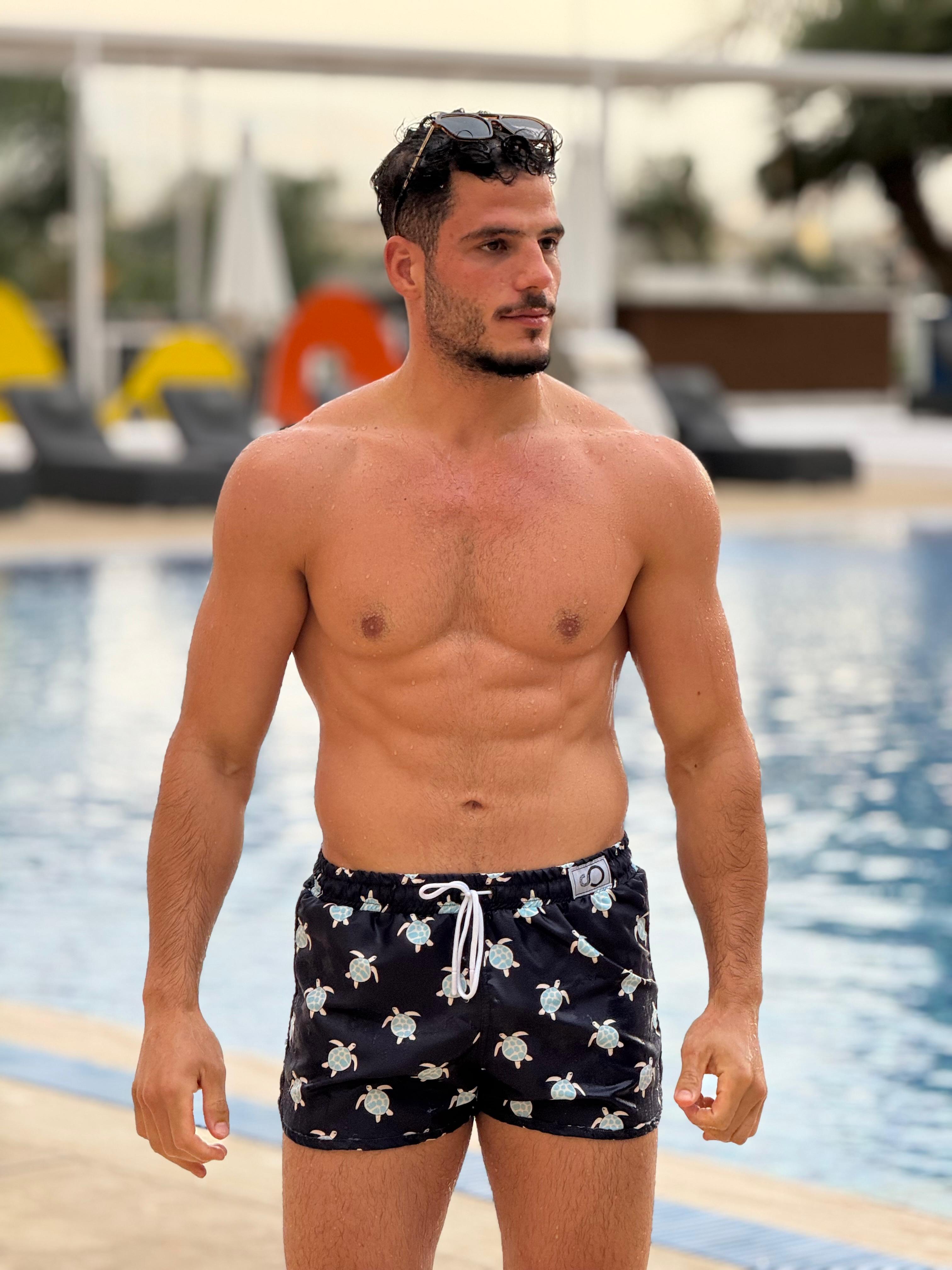 short patterned swimming trunk